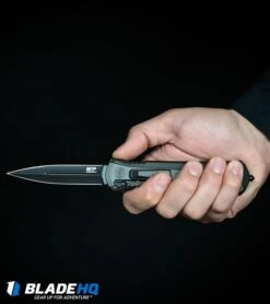 S&W M&P OTF Assist Finger Actuator Tanto Knife (3.2" Black Serr) 13 S&W M&P OTF Assist Finger Actuator Tanto Knife (3.2" Black Serr) -Knives Store MP OTF Spring Assisted Spear Point Knife Gray Black BHQ 80731 kp in hand web large 1