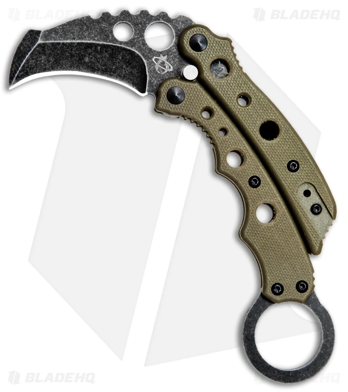 Mantis Vuja De Balisong Karambit Crossover Knife Desert Tan G-10 (2" Black SW) 1 Mantis Vuja De Balisong Karambit Crossover Knife Desert Tan G-10 (2" Black SW)